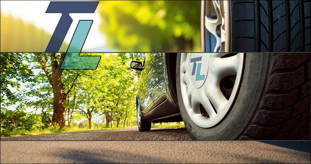 summer changeover services from Tireland Heavy Duty Automotive. This image shows a car tire on a  road with sunshine on the trees which looks like a Summer's day